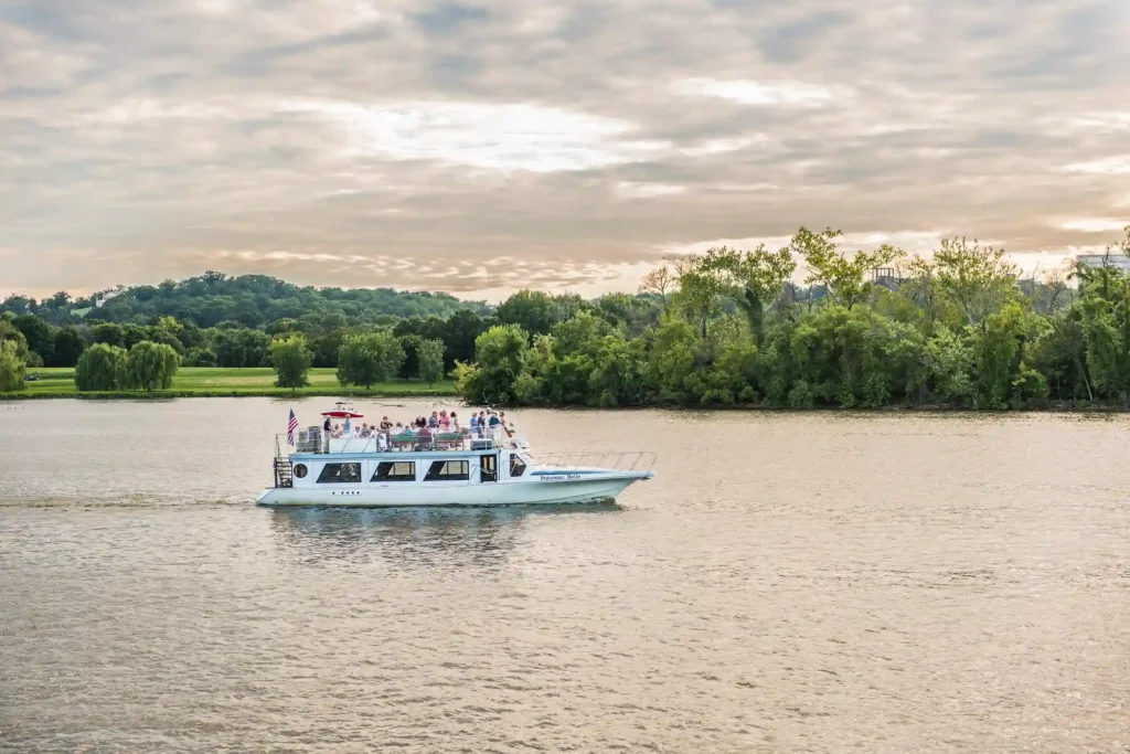 group having fun in potomac river with a boat private charter